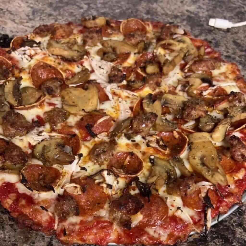 A pepperoni and mushroom pizza from Gant's Pizza