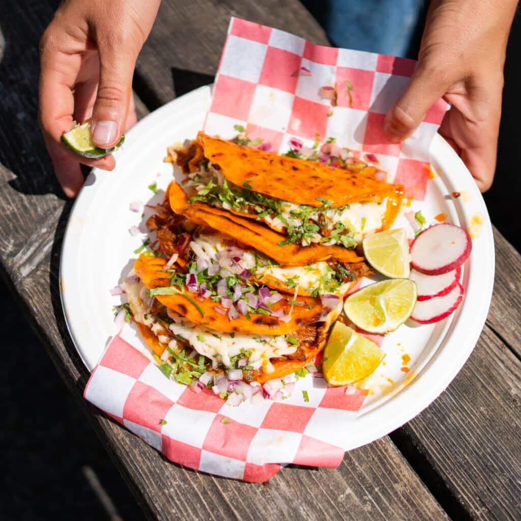 3 tacos on a plate from Los Agavez