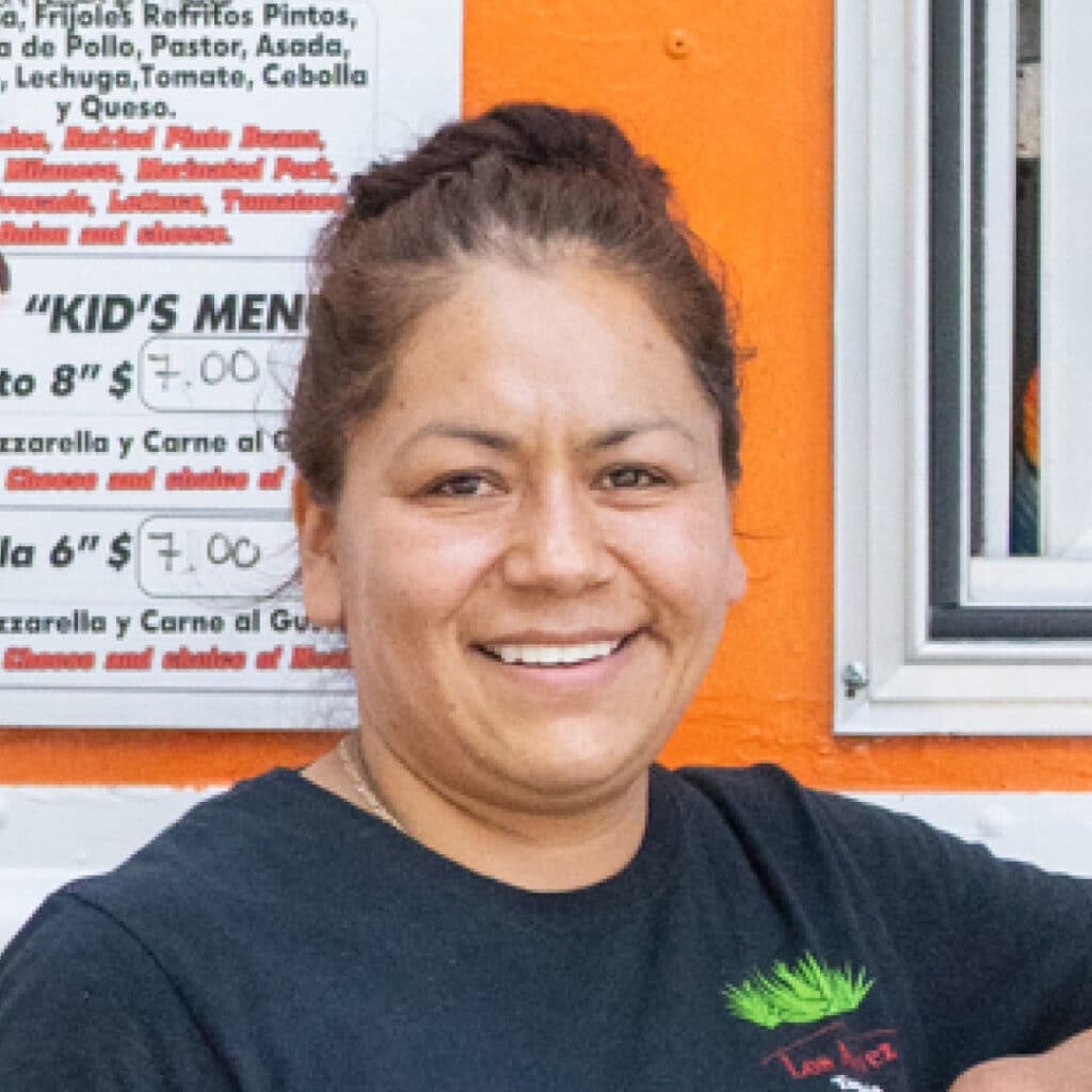 The smiling owner of Los Agaves